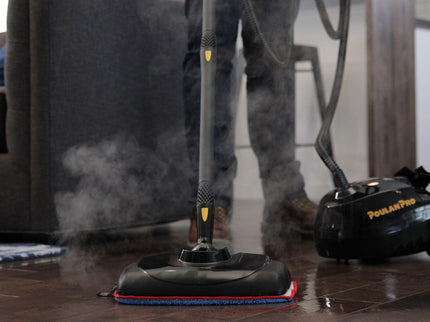 Image of the PP330 steam cleaner being used on hardwood floors highlighting the features of the mopping head and the mopping pad, as well as the length of the hose.