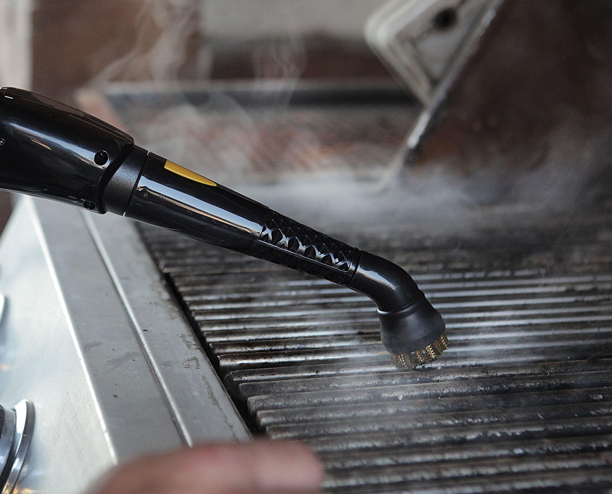 mage of the PP350 steam cleaner being used on a grill grate for a hot grill highlighting the features of a brass brush head and getting the tough spots and hard to get materials as well as ease of use.