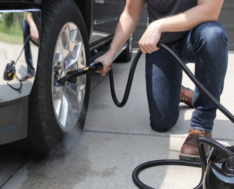 Using a Poulan Pro PP330 Multi-Purpose Steam Cleaner to clean a truck tire